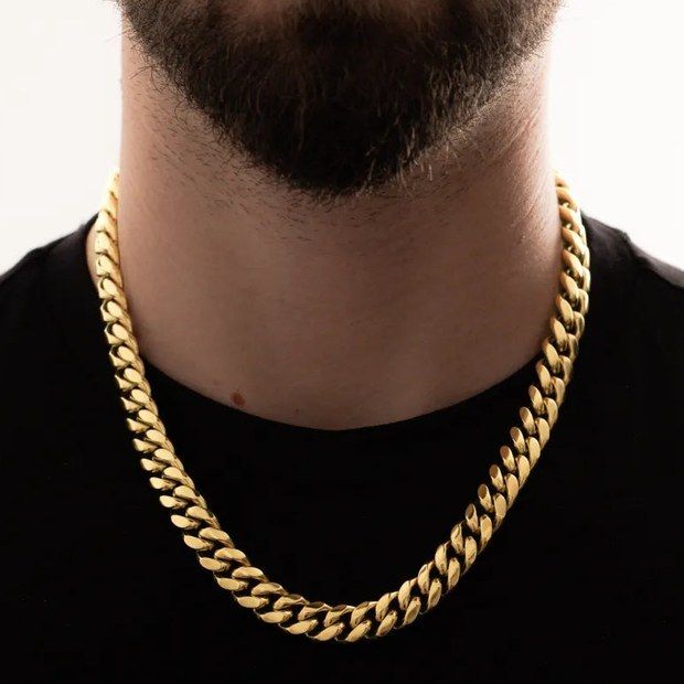 The 12mm Cuban link worn open at the collar